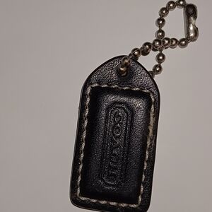 Coach Black Leather Tag with Silver Accents